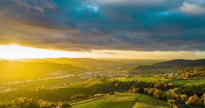 Drone view of Hyperlapse over vineyard and rural landscape, region Swabian Forest, valley Remstal, Baden-Wuerttemberg, Germany, Europe