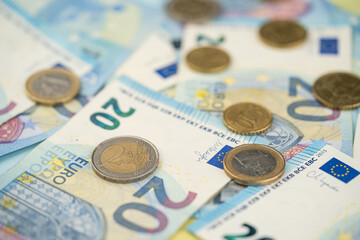 many 20 euro bills and various euro coins