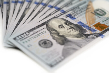 100 dollar bills on a white background
