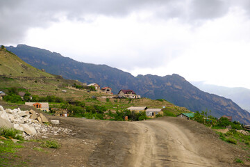 Fototapeta na wymiar A wiev of road in a village in the mountains