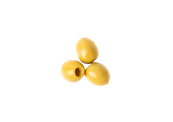 Delicious green olives isolated on white background. Olive and olive tree branches on a white table. Delicacy.
