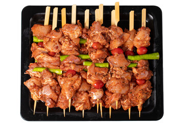 Chicken skewer. Chicken skewers with raw sauce isolated on white background