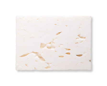 Slice of Greek feta, brined white cheese, cross section. Traditionally a cheese made of a mix of sheep and goat milk, matured in brine, with soft, moist texture and with fresh, salty and acidic taste.