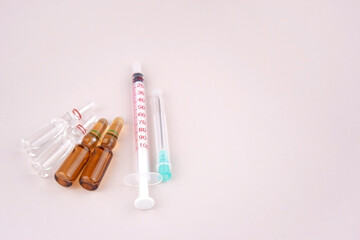 Many medical ampoule on light background. Medicines concept.