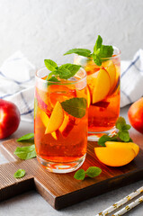 Peach Lemonade, Refreshing Drink, Cocktail, Iced Tea, Tasty Peach Cold Summer Drink on Bright Background