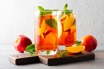 Peach Lemonade, Refreshing Drink, Cocktail, Iced Tea, Tasty Peach Cold Summer Drink on Bright Background