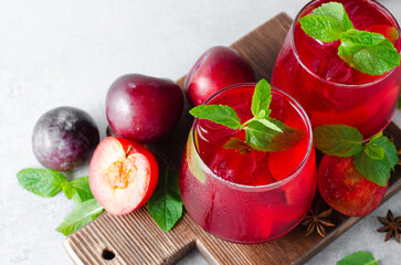 Plum Lemonade, Refreshing Drink, Cocktail, Iced Tea, Plum Summer Drink on Bright Background