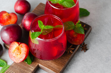Plum Lemonade, Refreshing Drink, Cocktail, Iced Tea, Plum Summer Drink on Bright Background