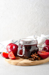 Plum Jam in a Jar, Delicious Homemade Plum Jam on Bright Background