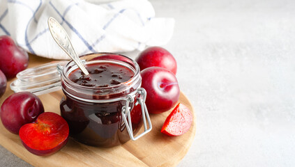 Plum Jam in a Jar, Delicious Homemade Plum Jam on Bright Background
