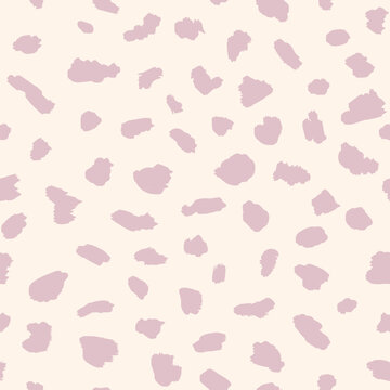 Abstract animal skin vector seamless pattern. Simple texture with irregular brush spots, dots, strokes. Cute pink background. Wild leopard print. Simple minimal repetitive design for decor, textile