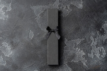Small jewelry box on gray background close up
