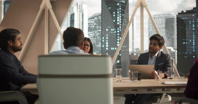 Cinematic Footage of a Successful CEO Making a Report to a Board of Directors During an Annual Financial Meeting in the Conference Room. Business People and Partners Discussing International Markets