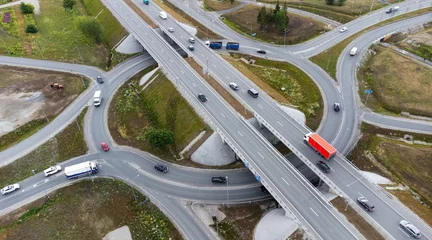 Fotobehang Donkergrijs Drone aerial view of cars and trucks on the motorway