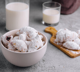 Homemade cookies twisted, sprinkled with powdered sugar