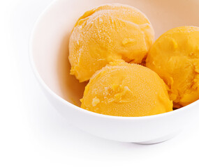 Fototapeta na wymiar Mango ice cream, sorbet in a plate