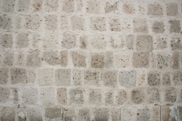 White walls and doors of the old streets of the city of Arequipa in Peru.
