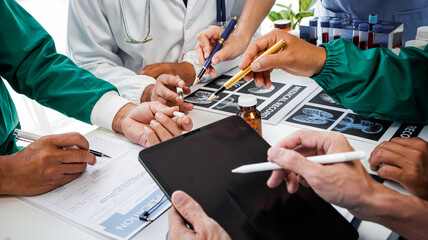 Businessman shaking hands with doctor in conference room Doctor and pharmacist shaking hands in medical office Salesman with new medicines shaking hands in hospital with medical team