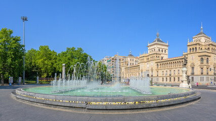 Summer Mornings Unveiled: Zorrilla Square's Enchanting Fountain View - obrazy, fototapety, plakaty