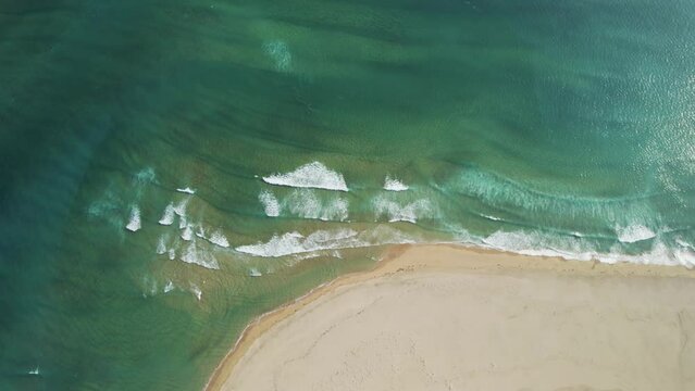 Aerial view of Radisandur coastline with sand along the ocean shoreline, Westfjords, Iceland.