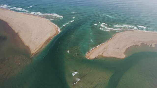 Aerial view of Radisandur coastline with sand along the ocean shoreline, Westfjords, Iceland.