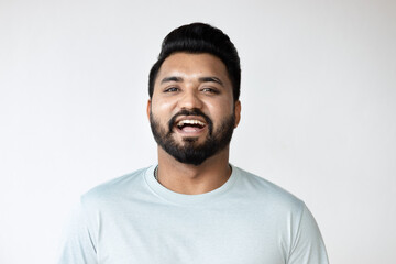 Confident Trendy Happy South Asian Male laughing, Portraying Joy and Success