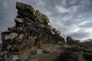 Fototapeta na wymiar Stone wall with dramatic sky