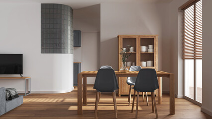 Minimal dining and living room in white and gray tones. Wooden table with chairs, glass block wall over kitchen. Cabinets and sofa. Scandinavian modern interior design