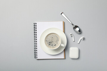 Concept of freelance, composition with hot drink and headphones