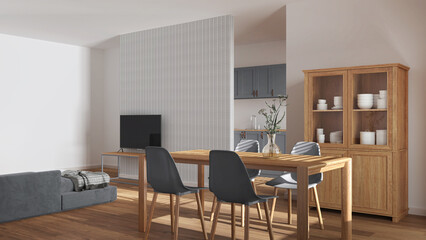 Scandinavian wooden dining and living room in white and gray tones. Table with chairs, partition wall over kitchen. Cabinets and decors. Minimal interior design