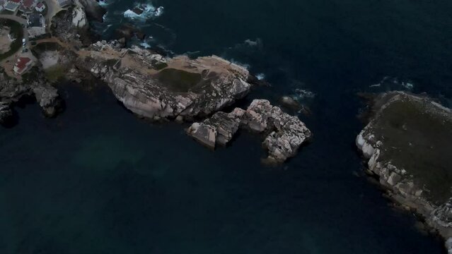 Aerial view of Ilha da Fora island in Baleal along the Ocean coastline in Leiria, Portugal.