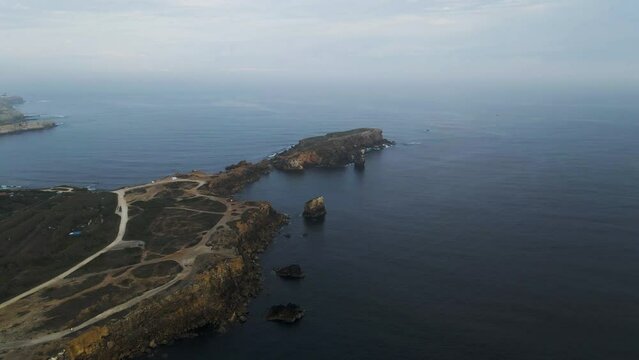 Aerial view of Ilheu da Papoa, a small island in Peniche facing the Atlantic Ocean, Leiria, Portugal.