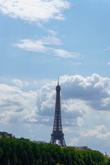 Fototapeta na wymiar Eiffel Tower over beautiful blue cloud sky Paris France