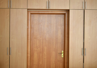 Entrance wooden doors in the office. Internal doors.