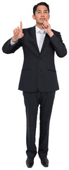 Digital png photo of thinking asian businessman showing index finger on transparent background