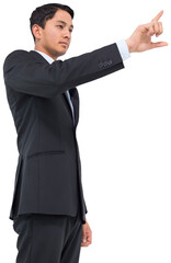 Digital png photo of focused asian businessman showing index finger on transparent background