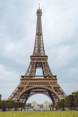 Eiffel Tower over beautiful blue cloud sky Paris France