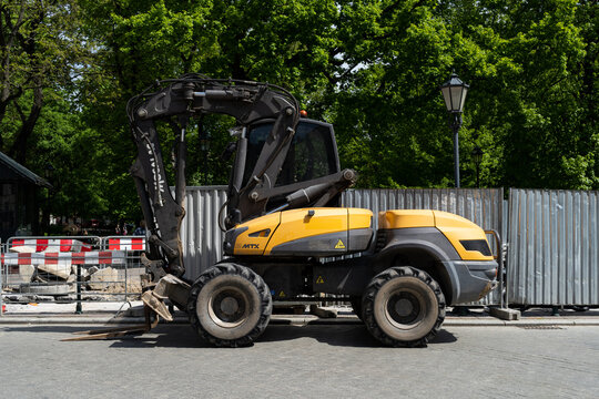 Mecalac 12MTX, wheel excavator loader or digger. Construction site equipment, digging machine on May 5, 2023 in Krakow, Poland.