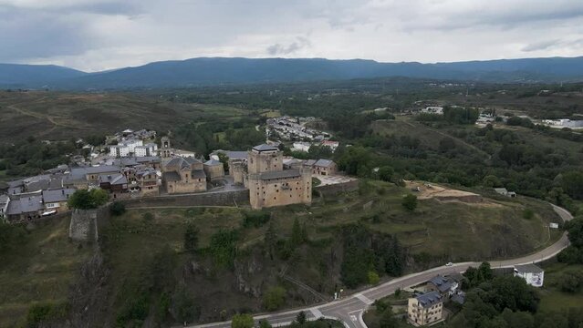 Aerial view of Puebla de Sanabria, a small town with a medieval castle along the Rio Tera river in Zamora, Spain.