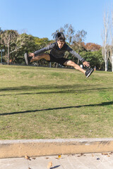 Young man practicing Kung Fu in the park