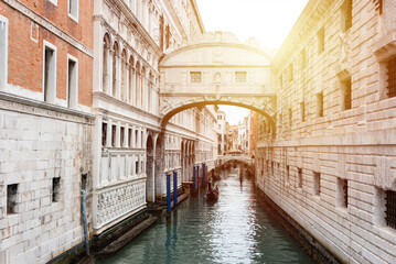 Fototapeta na wymiar Bridge of Sighs over narrow canal in Venice, Italy