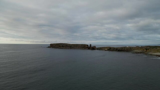 Aerial view of Ilheu da Papoa, a small island in Peniche facing the Atlantic Ocean, Leiria, Portugal.