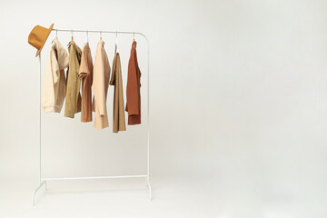 Wardrobe rack with different clothes, concept of different clothes