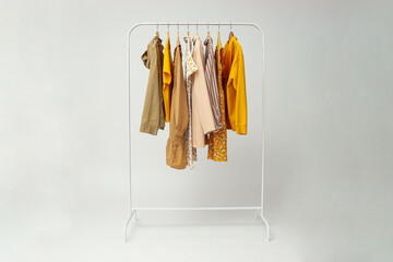 Wardrobe rack with different clothes, concept of different clothes