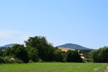 Grain fields up to a volcano hill