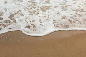 Sea Wave on the Sand Beach Close Up Background