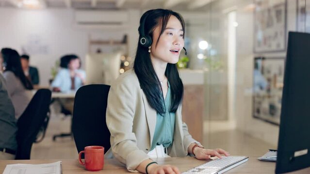 Call center, computer or happy Asian woman explaining help desk service, software system or CRM communication. Tech support conversation, consultation and female consultant talk in coworking office