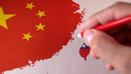 Hand drawing a red line between Taiwan isle and Mainland China. - Powered by Adobe