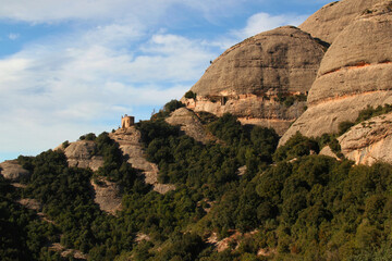 View of the mountains and the church Ermita de Sant Joan in the National park near the monastery of Montserrat near Barcelona, Catalonia, Spain