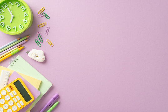 Embrace the concept of learning with this top-down image featuring a child's workplace with stationery on an isolated light purple backdrop, allowing for the inclusion of text or promotional material